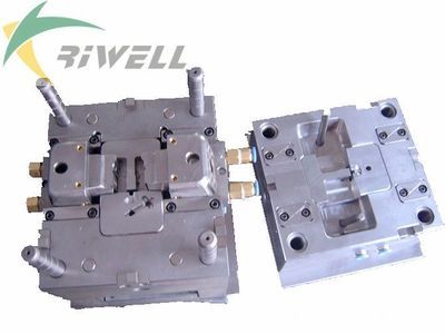 优质供应汽车遥控器二次成型包胶模具——余姚市日昌模塑五金厂